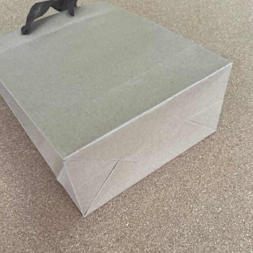 Крафт-пакет с ленточными ручками 18×10×23 см